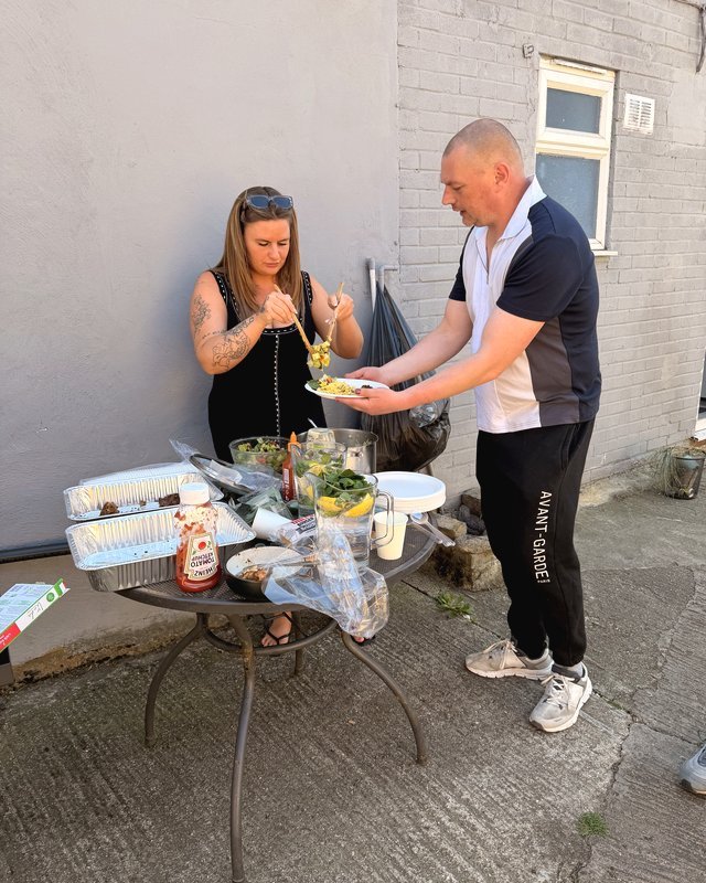 Sharing a meal together outdoors